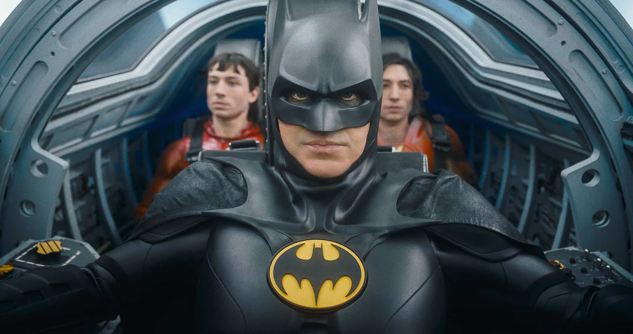 Two Ezra Millers and Michael Keaton in this image from DC Studios