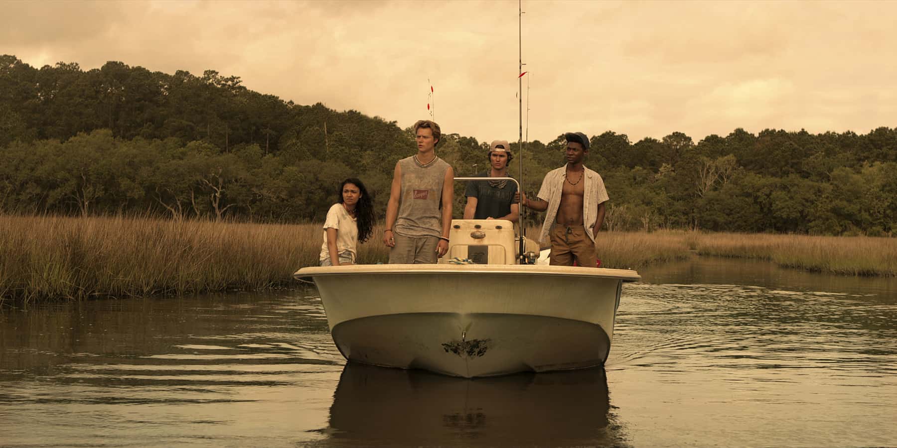Madison Bailey, Rudy Pankow, Chase Stokes, and J.D. in this image from Red Canoe Productions