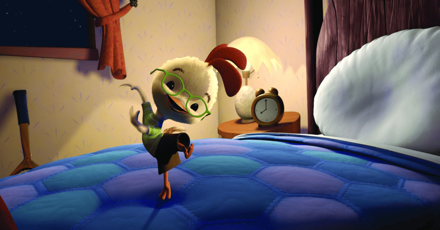 Chicken Little jumping on a bed in this image from Walt Disney Animation Studios