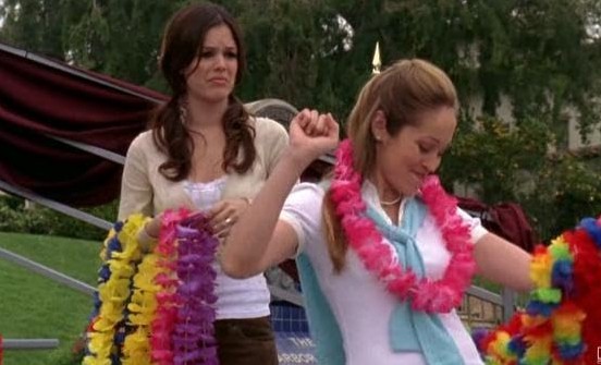 Two women with leis are featured in this image from Warner Bros. Studios