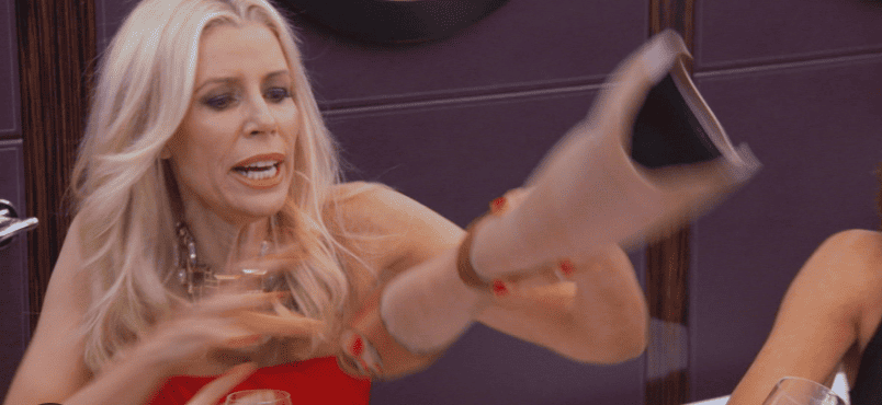 Aviva Drescher takes off her prosthetic leg and throws it onto the table in this image from Ricochet Television