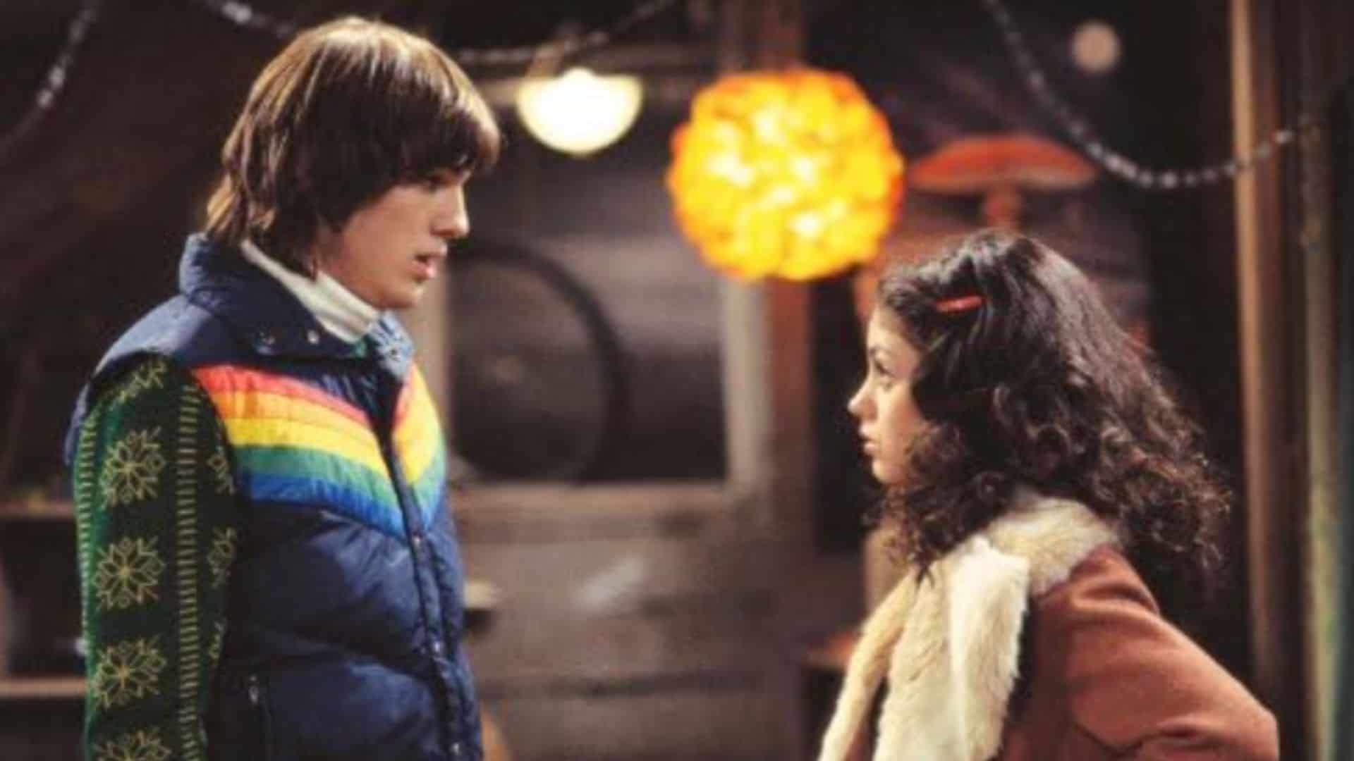Ashton Kutcher and Mila Kunis arguing in this image from The Carsey-Werner Company