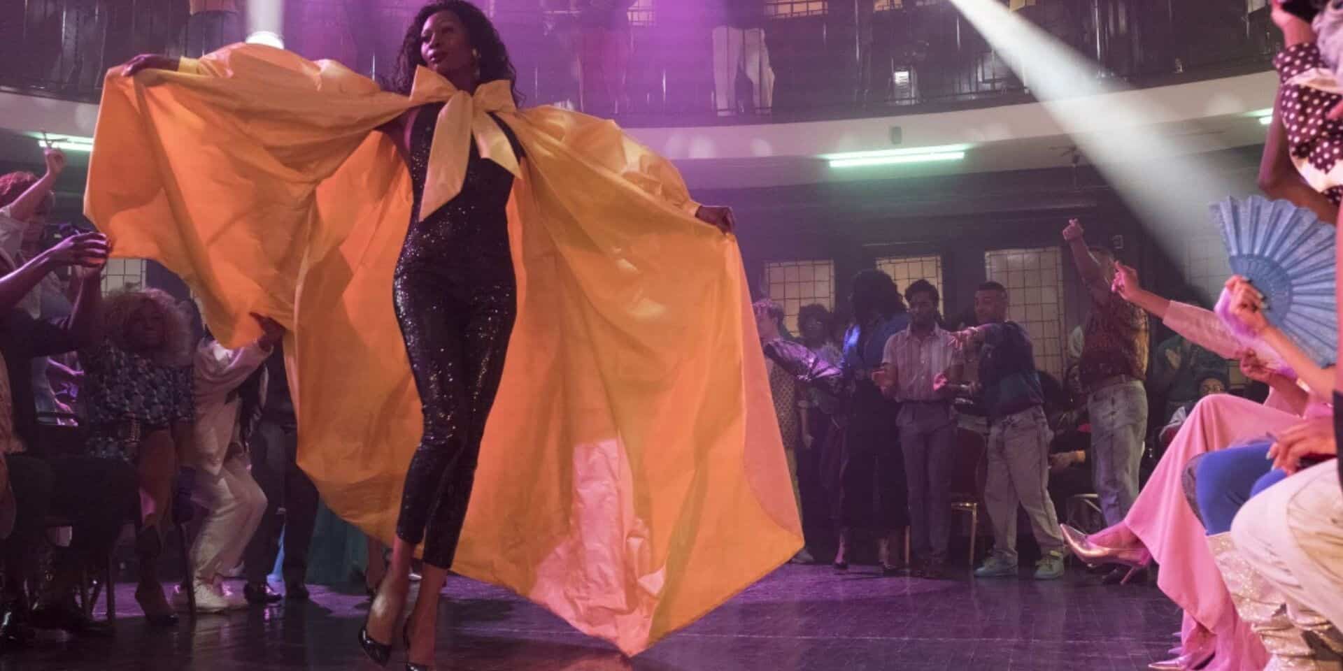Dominique Jackson walks in a yellow cape during a ball in this image from FXP.