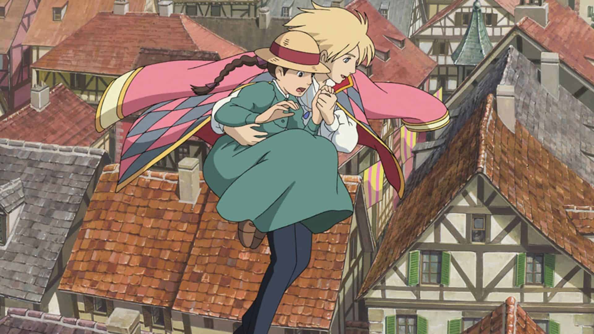 Howl carries Sophie as they fly above town in this image from Studio Ghibli