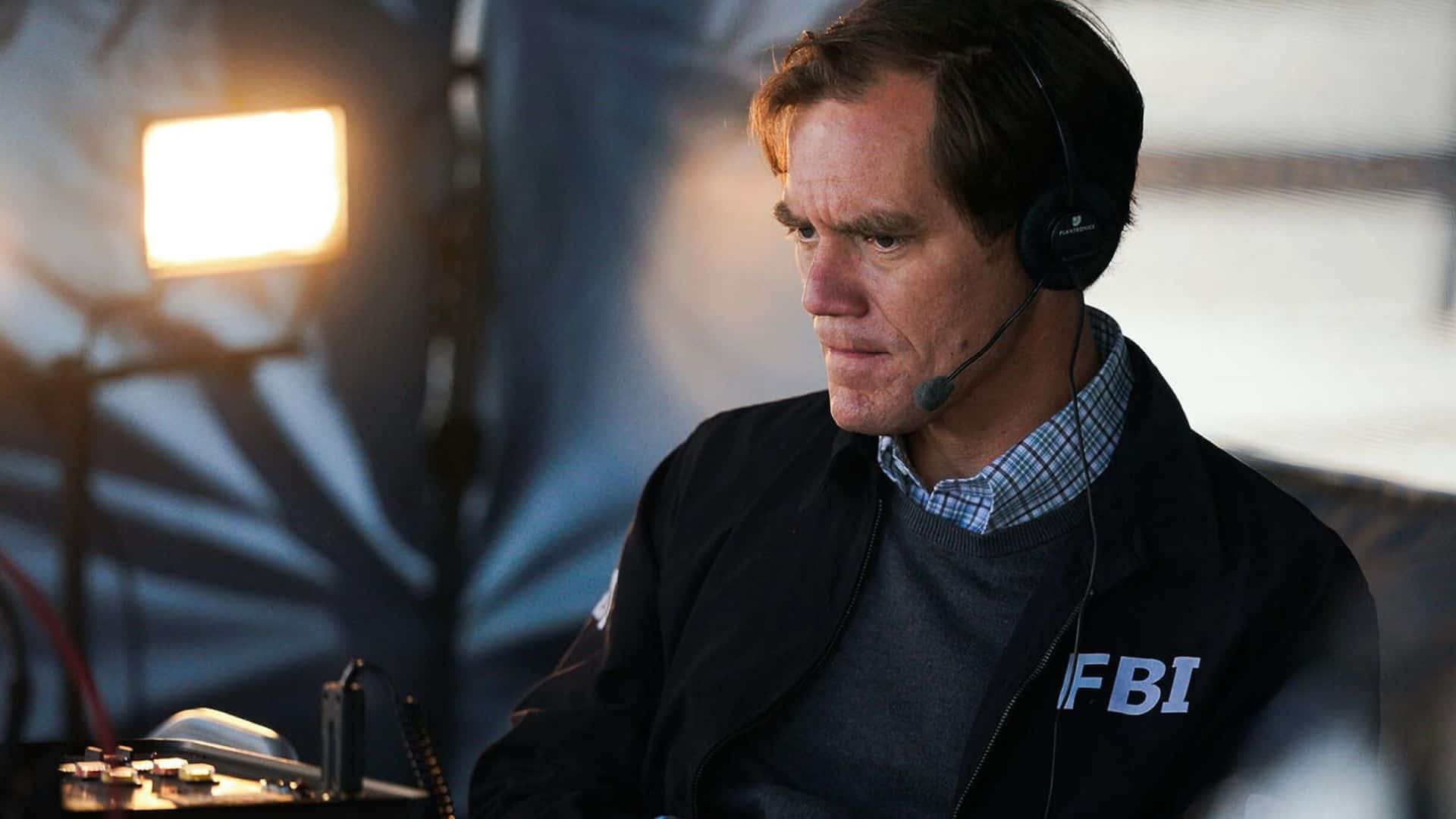 Michael Shannon in an FBI jacket and headset in this image from Spyglass Entertainment.