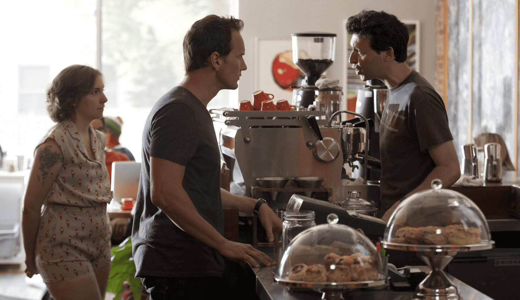 Patrick Wilson placing an order at a coffee shop in this image from Apatow Productions