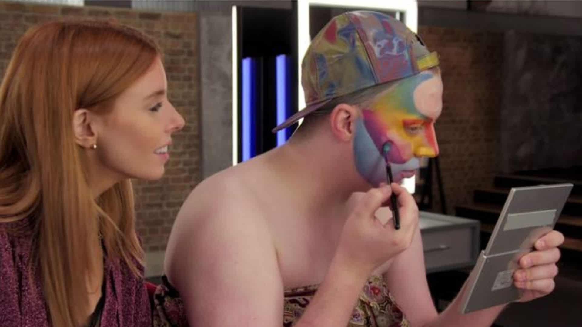 Stacey Dooley watches Ellis Atlantis do their makeup in this image from BBC Three