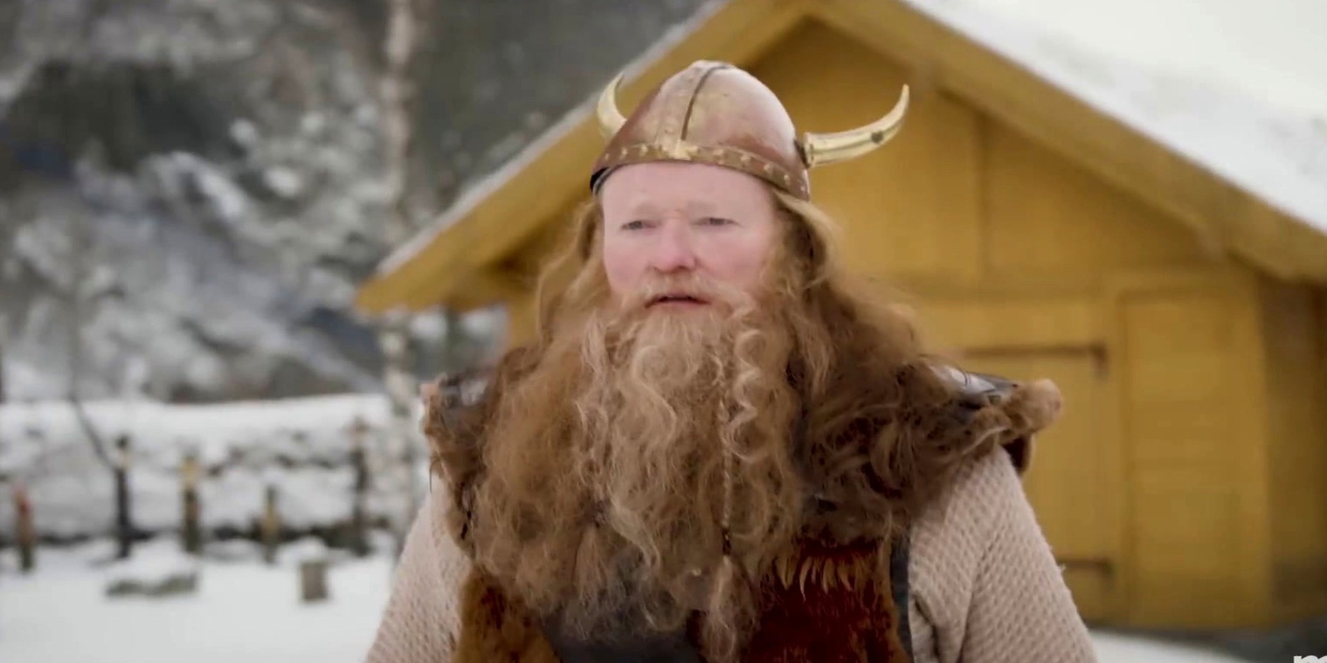 Conan O’Brien wears a Viking outfit while standing outside in the snow in this image from Conaco.