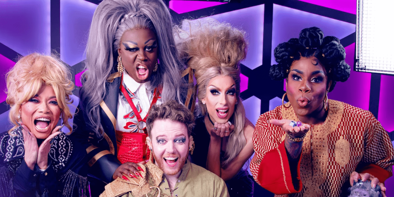 Four drag queens pose amusingly around a man dressed as an elf in this image from Dropout