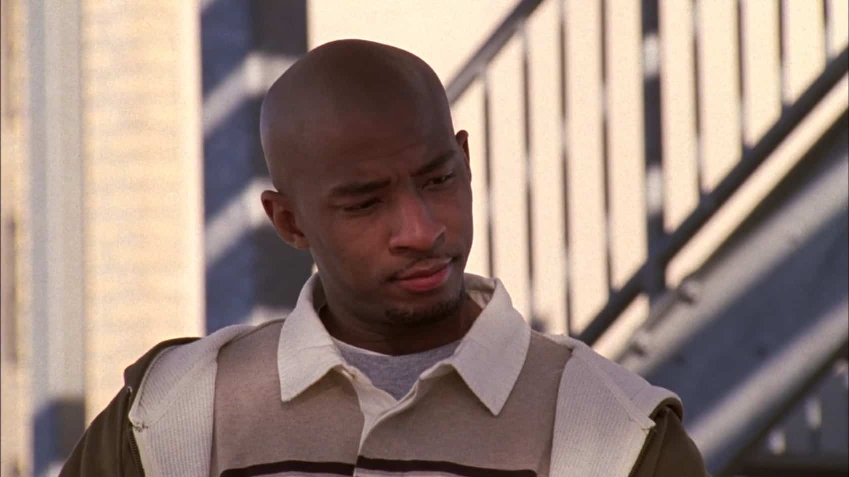 A man listens during a conversation outdoors in this image from Tollin/Robbins Productions