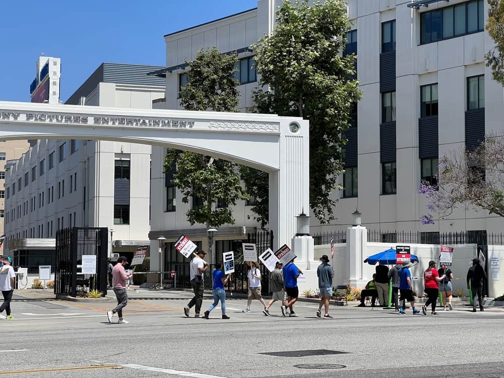 A small group of WGA members protesting in front of Sony Pictures Studios in this image from Shutterstock