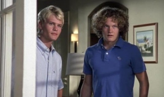 Two young men look guilty in this image from Warner Bros. Studios