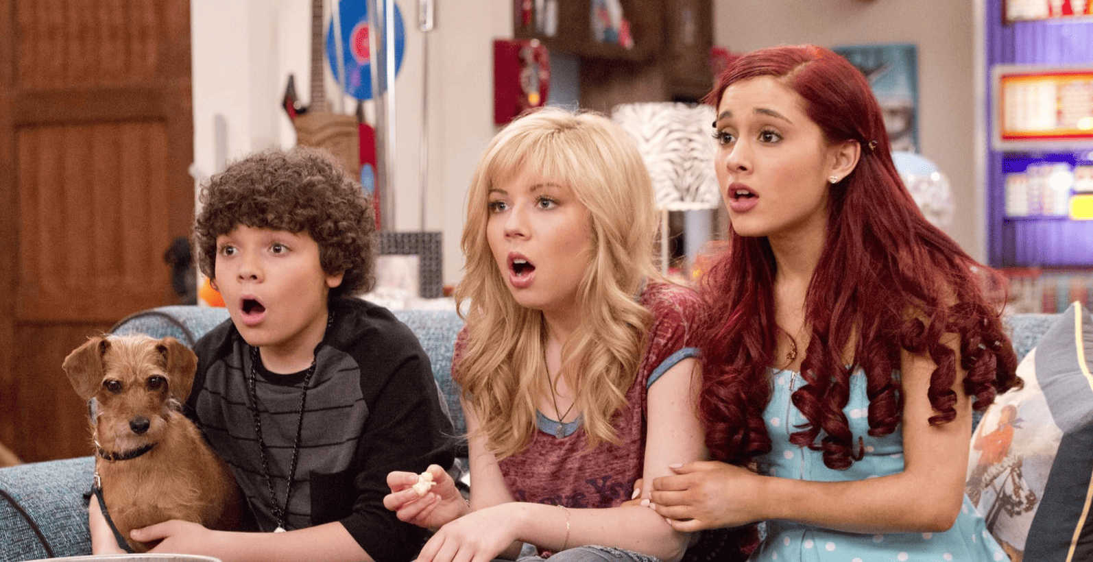Cameron Ocasio, Jennette McCurdy, and Ariana Grande sitting on a couch and gasping at something off-camera in this image from Nickelodeon Productions