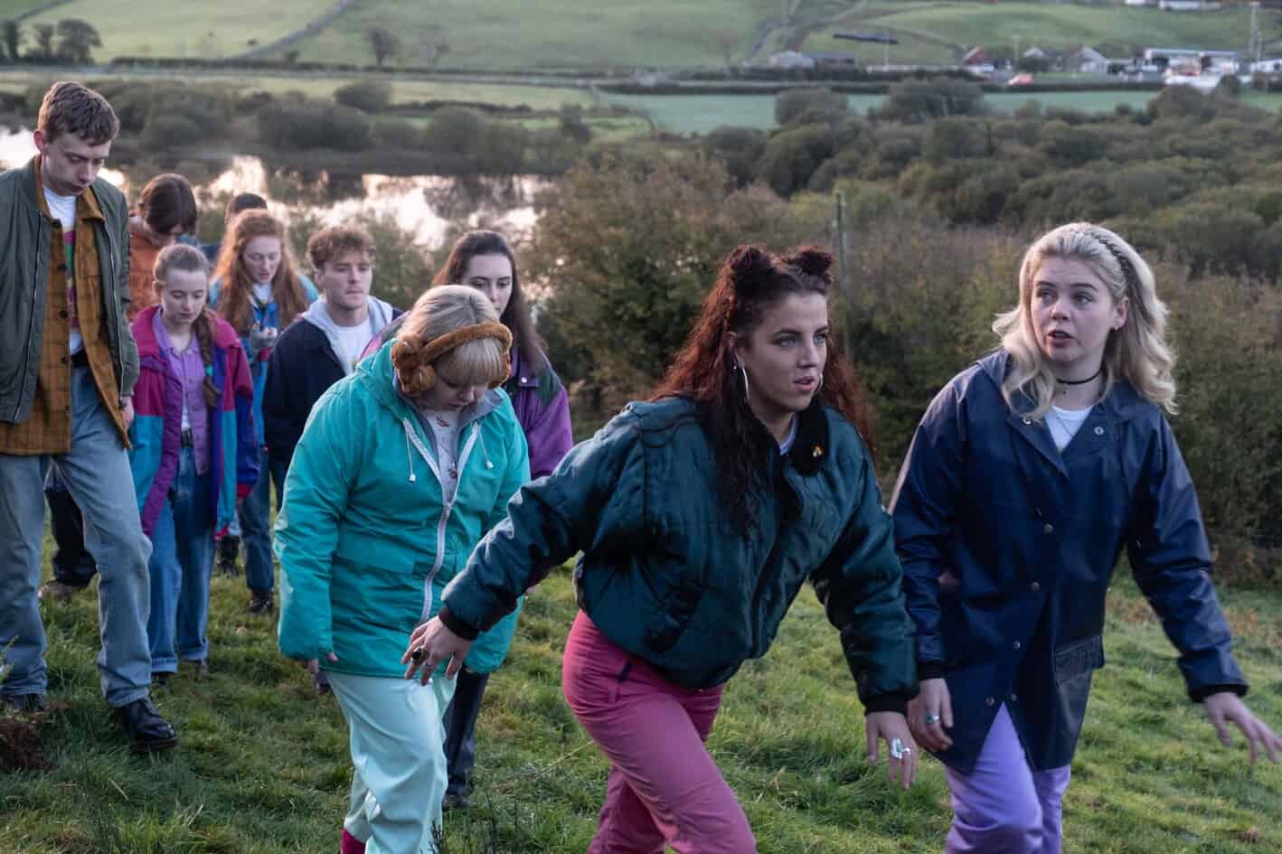 A group of girls march up a hill in this image from Hat Trick Productions.