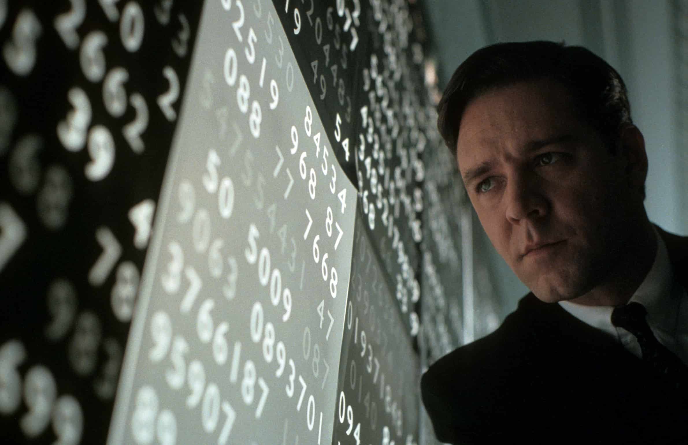  A man studies complex mathematics in this image from Universal Pictures.