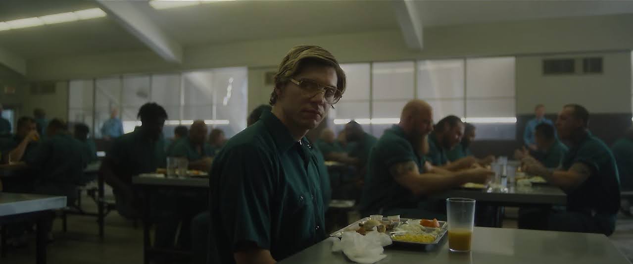 A man staring in a prison cafeteria in this image from Prospect Films.
