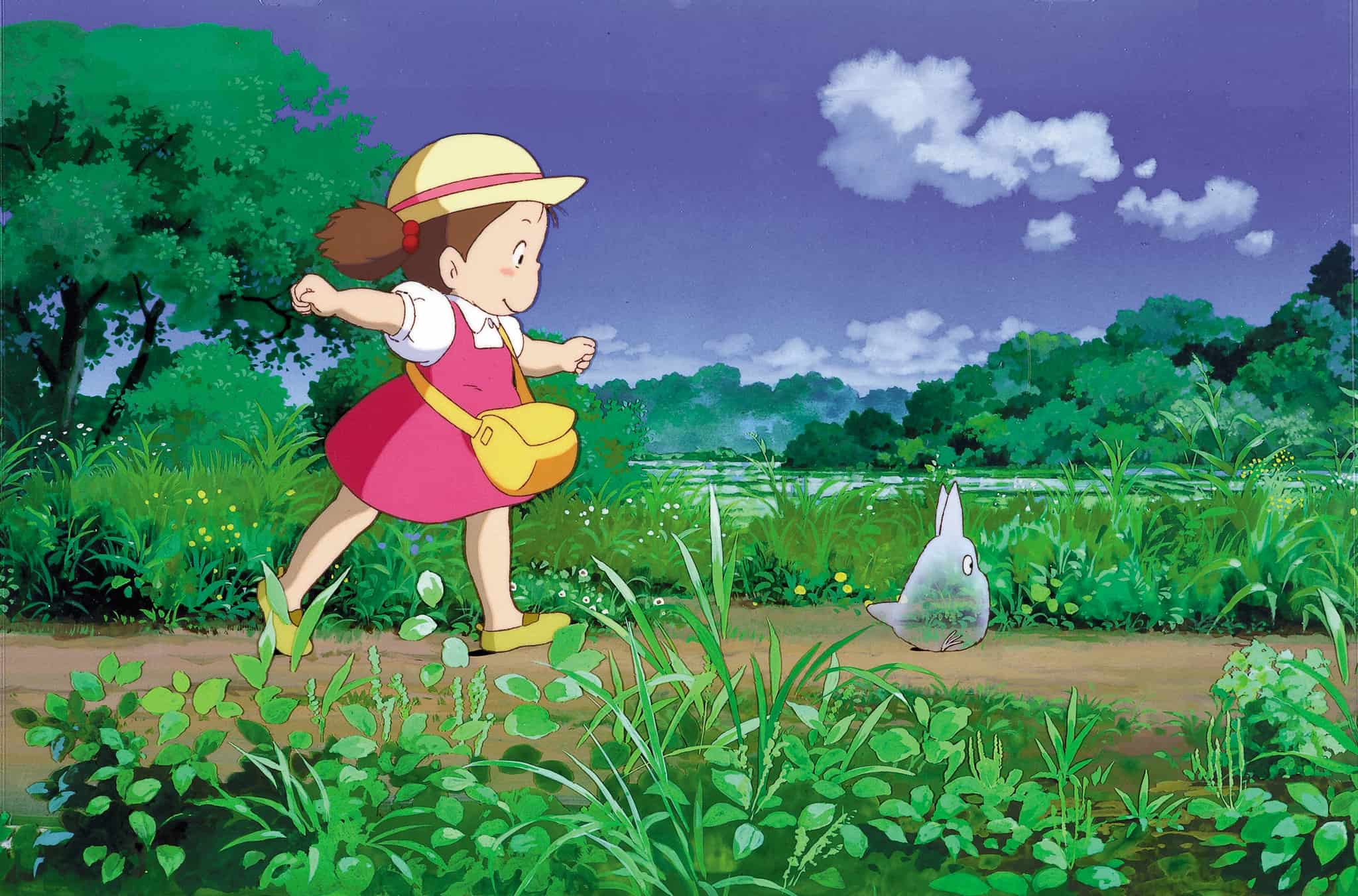 Anime young girl walking behind a transparent forest creature in this image from Studio Ghibli