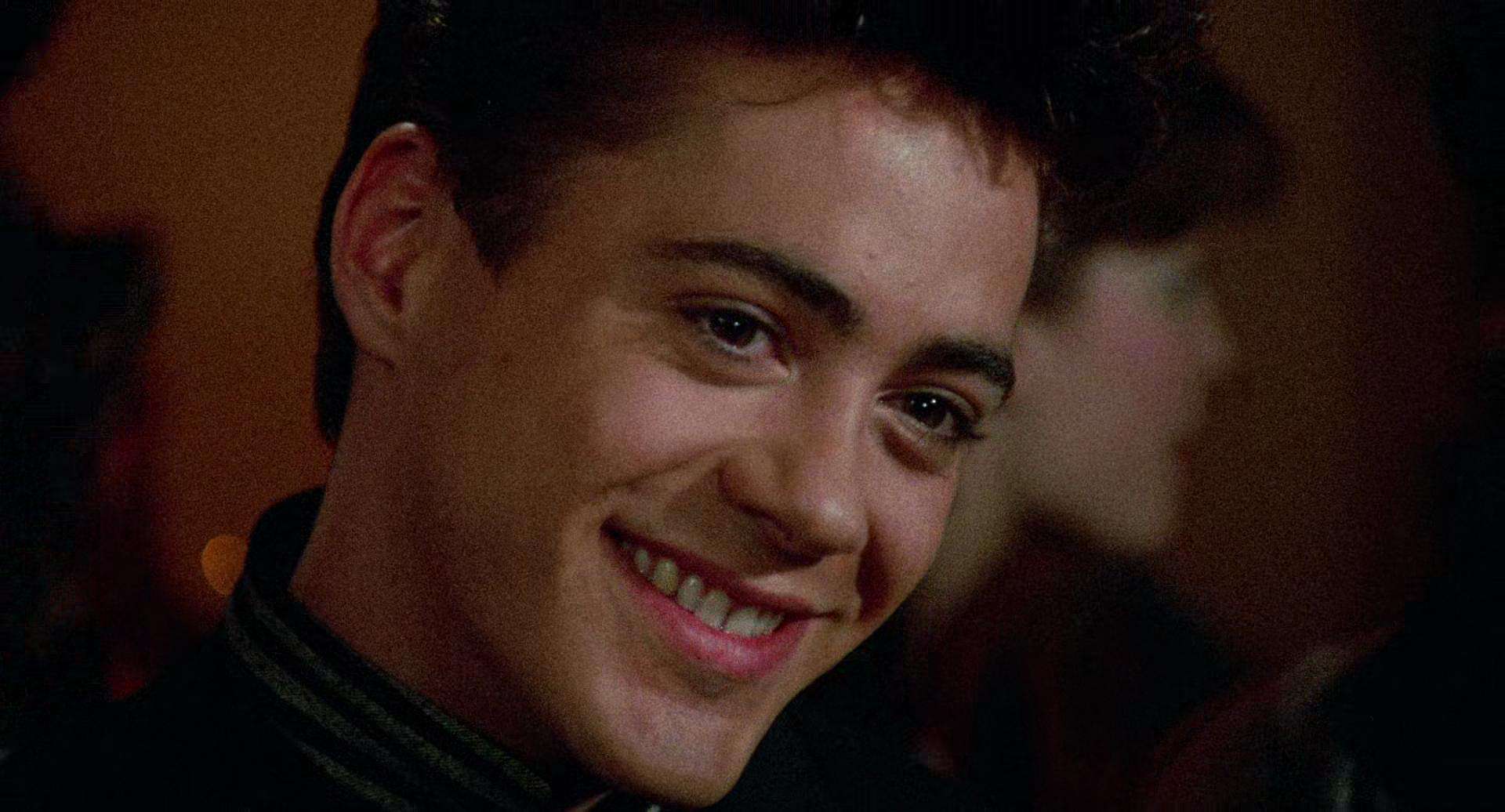 Robert Downey Jr. smiles in this image from Hughes Entertainment.