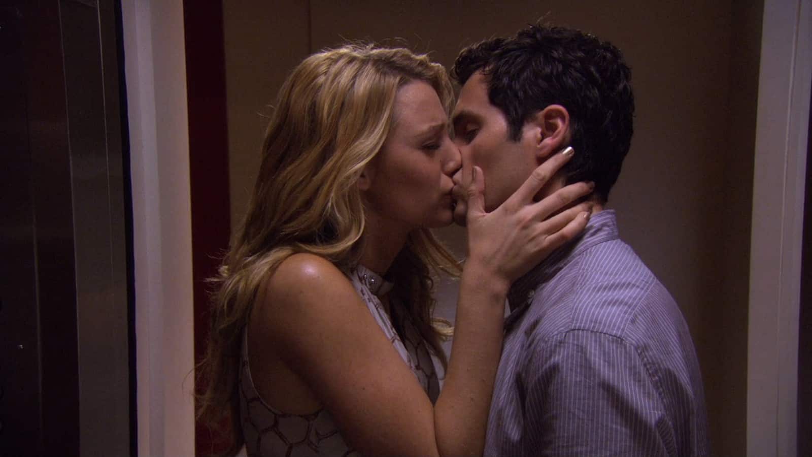  A girl tearfully kisses a boy in an elevator in this image from Warner Bros. Television.