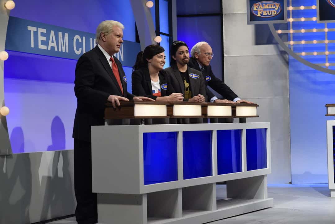 Four people parody Family Feud in this image from Broadway Video.