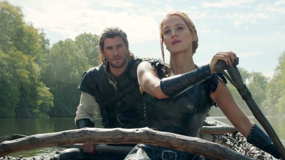 The Huntsman and Sara row down a river in this image from Roth Films.