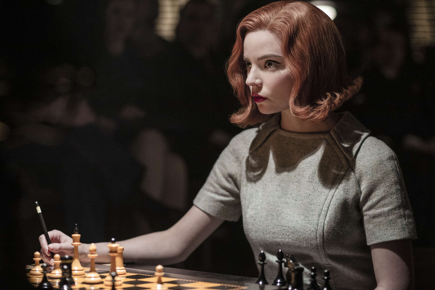 A woman sits at a chess table in this image from Wonderful Films.