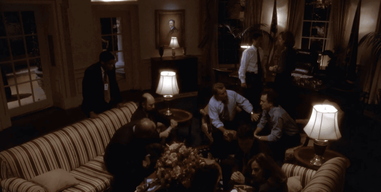 The president and his staff meet in the Oval Office in this photo from Warner Brothers Television.