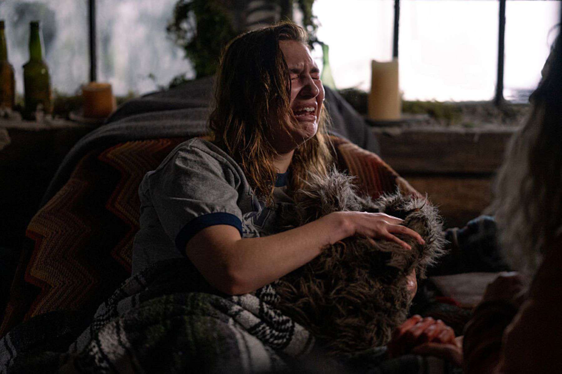 A crying girl holds a bundle in her arms in this photo by Showtime.