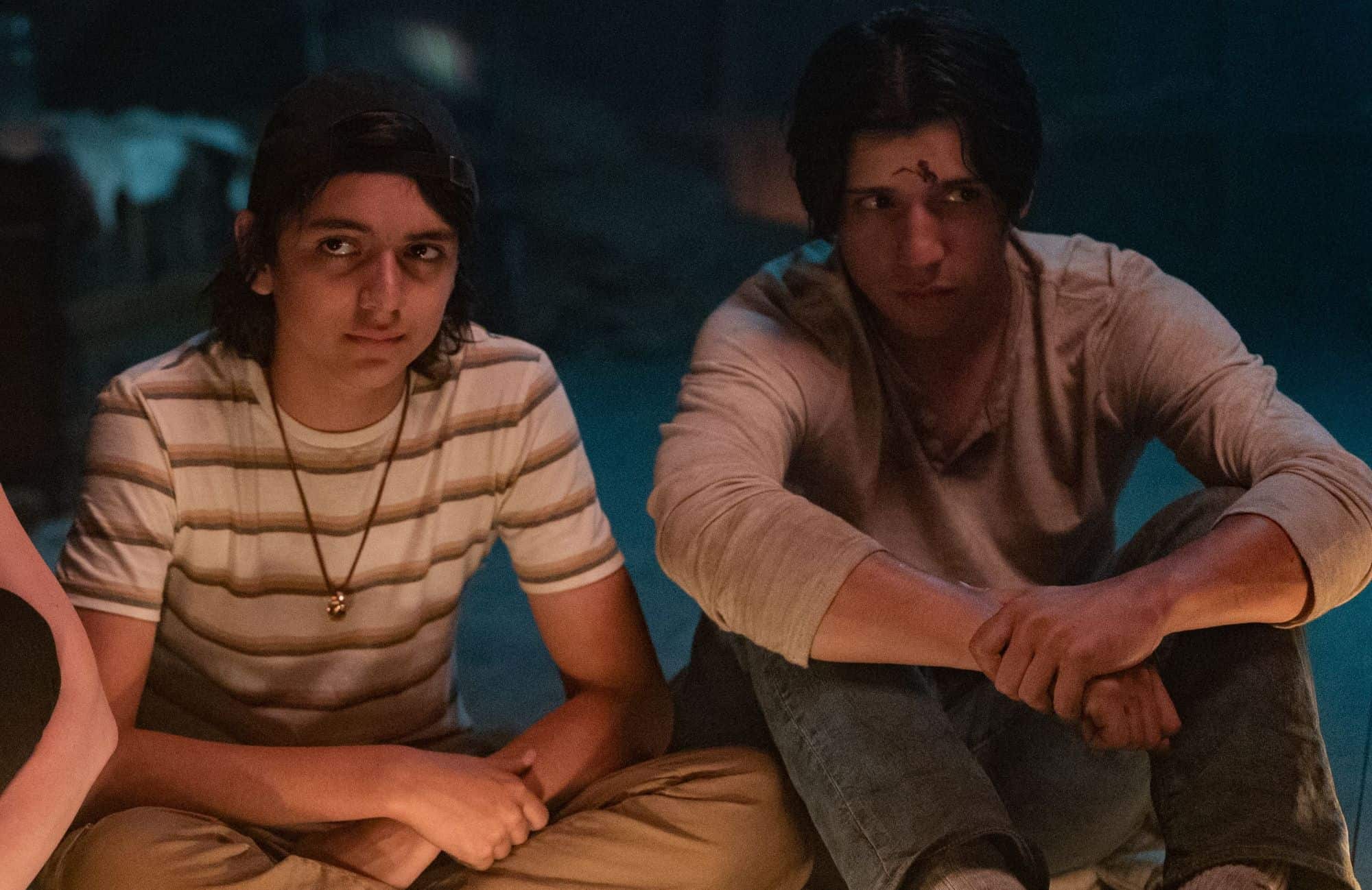 Teenage brothers sit side by side, looking at something offscreen in this photo by Showtime.