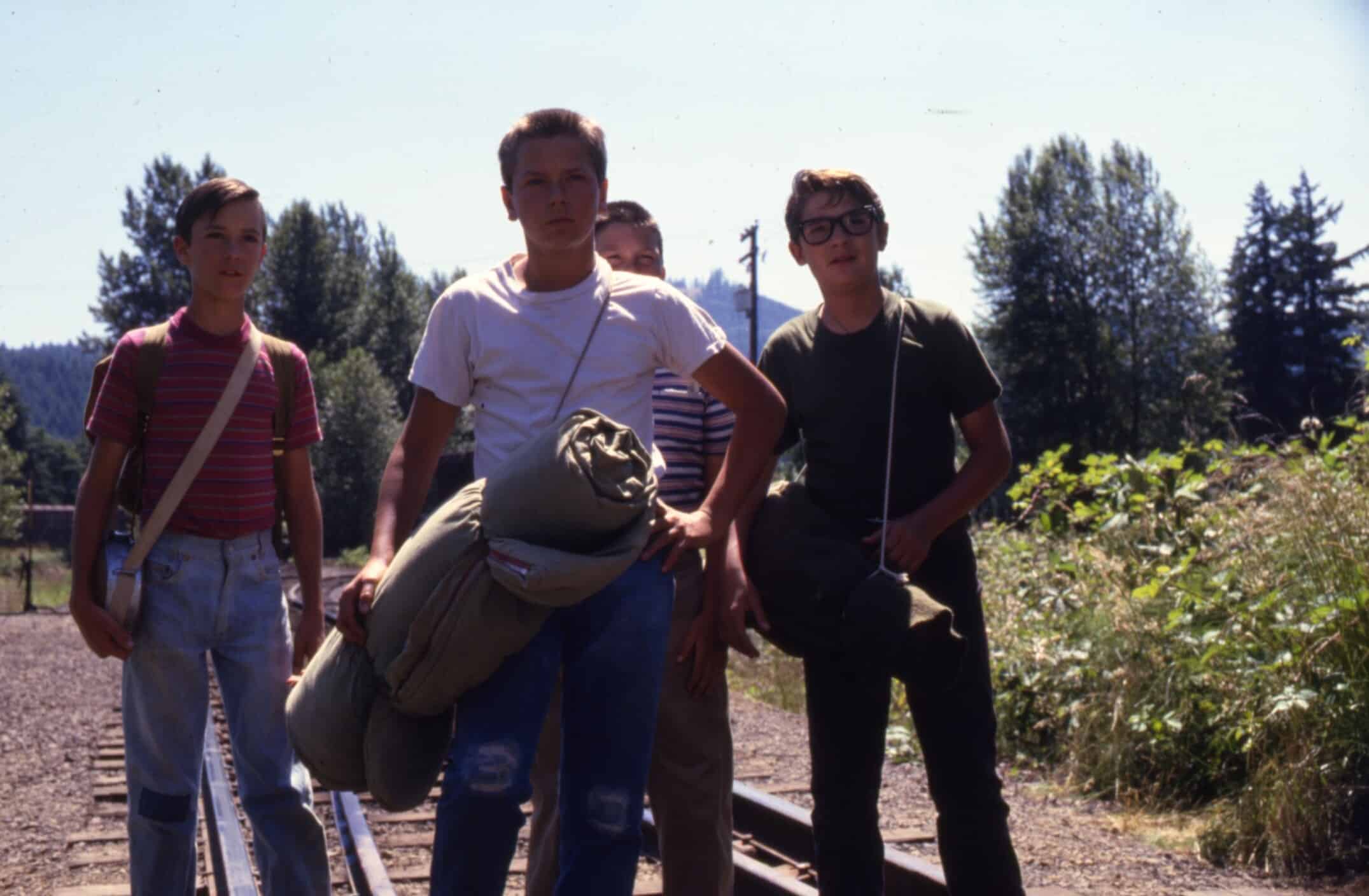 Young boys walk on a railroad track in this image from Act III Productions.