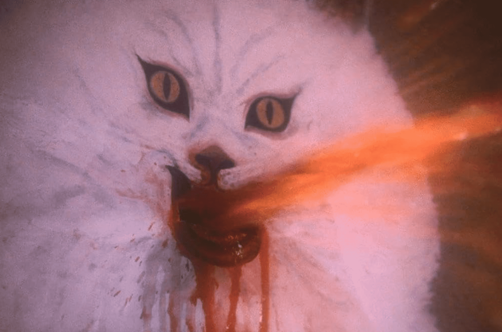 A wall painting of a cat spurts out what appears to be blood in this image from TSC.