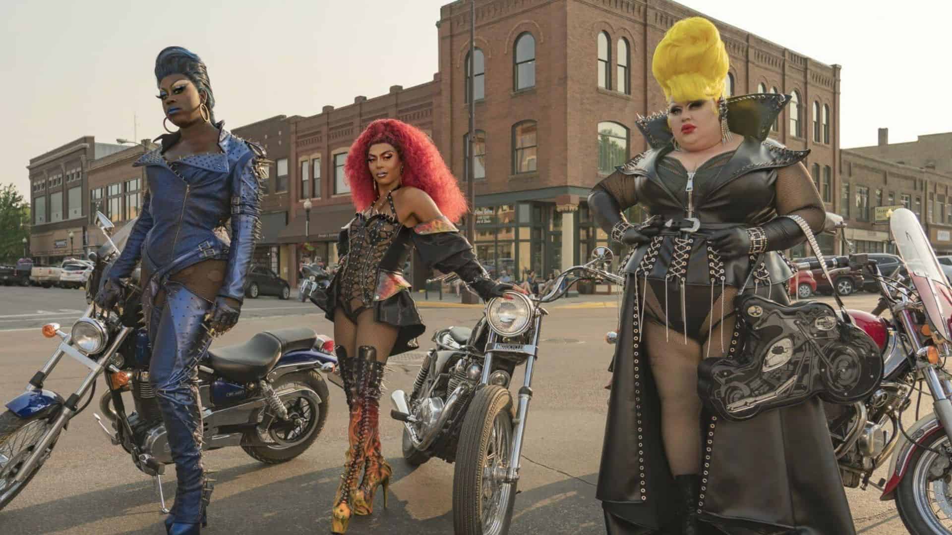 Three drag queens pose with motorcycles in this image from HBO Entertainment.