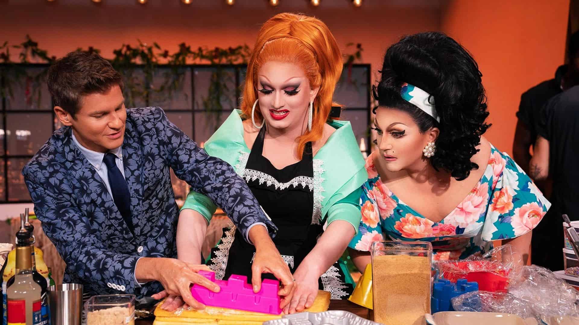 David Burtka, Jinkx Monsoon, and BenDeLaCreme decorate a cake in this image from Vox Media Studios