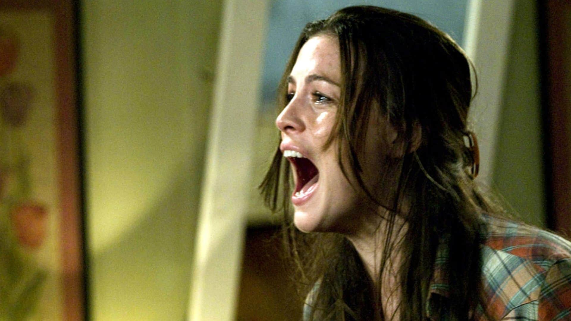 A woman screams in this image from Rogue Pictures. 