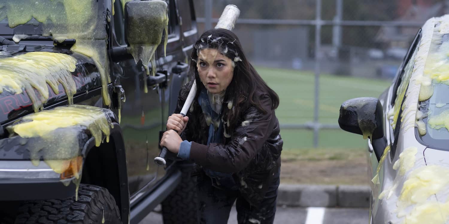 A slime-covered girl holding a baseball bat in this photo from Sony Pictures Television