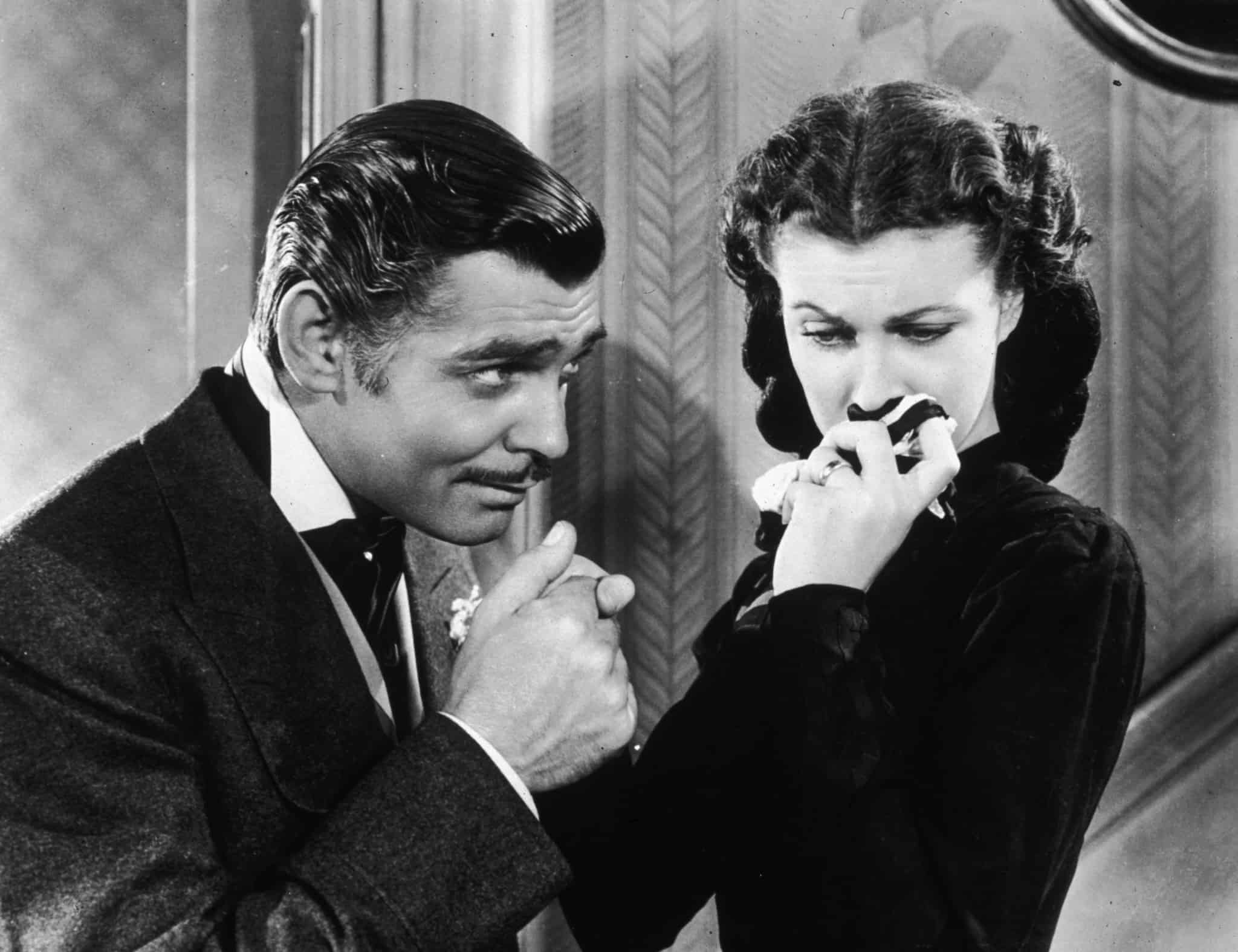 Clark Gable kissing the hand of Vivien Leigh in this image from Selznick International Pictures.