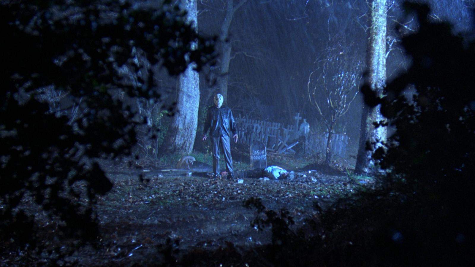 A hockey-masked man standing next to his own grave in this photo from Terror Inc.