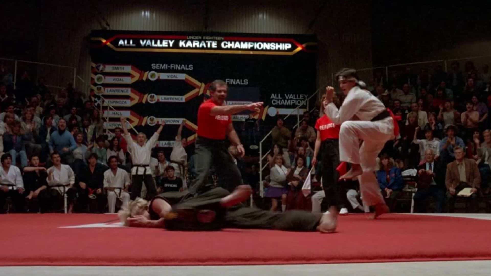 A man gets knocked on the ground in a karate match in this image from Sony Pictures.