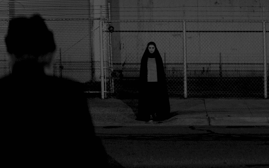 A woman stands across the street in this image from SpectreVision.