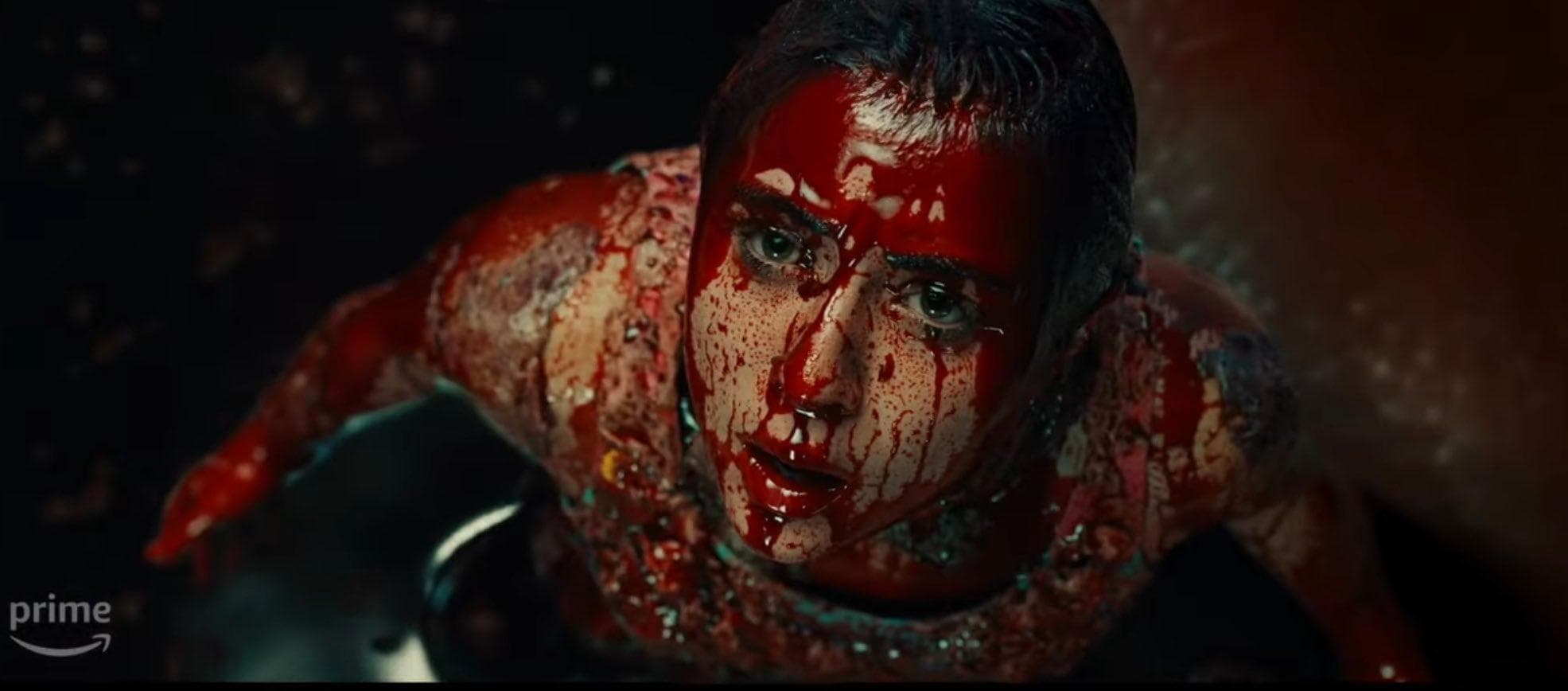 A woman is covered in blood in this image from Amazon Studios.