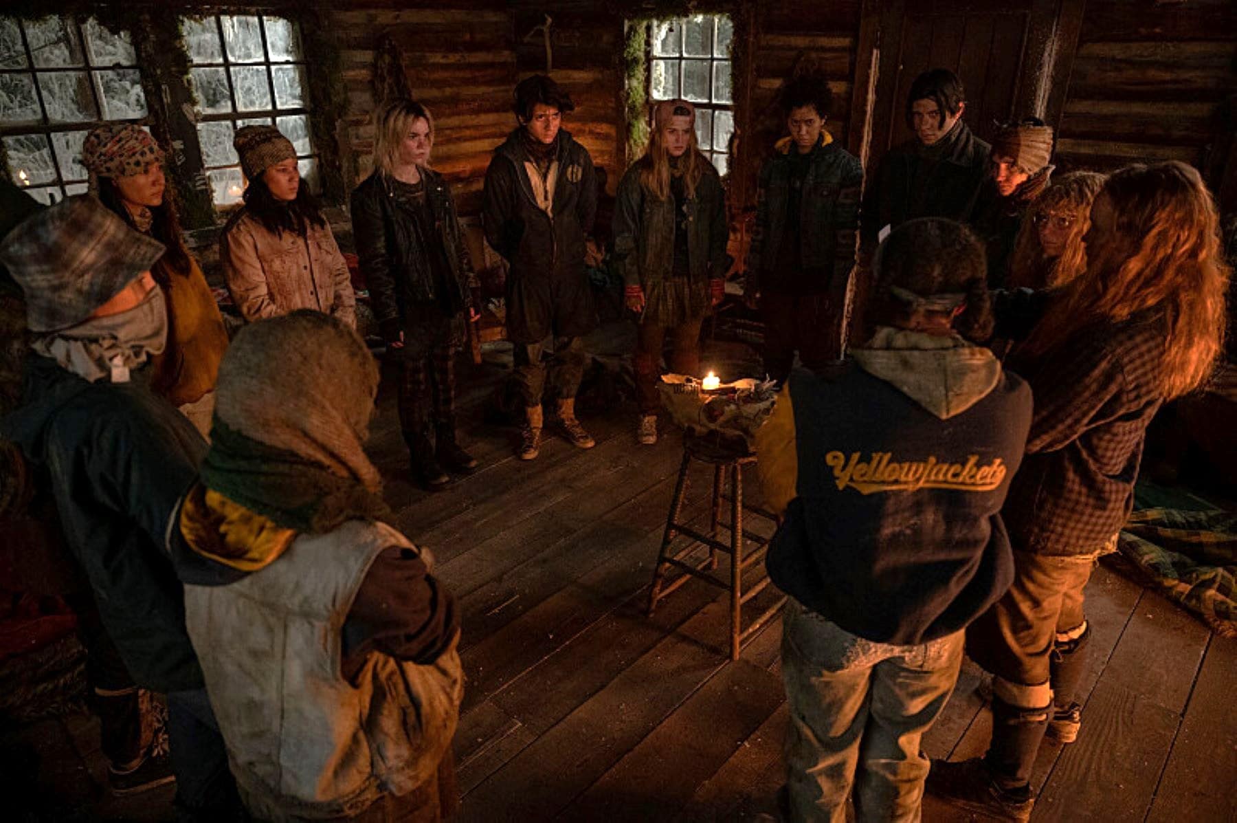 A group of teenagers stand in a circle in this photo by Showtime.