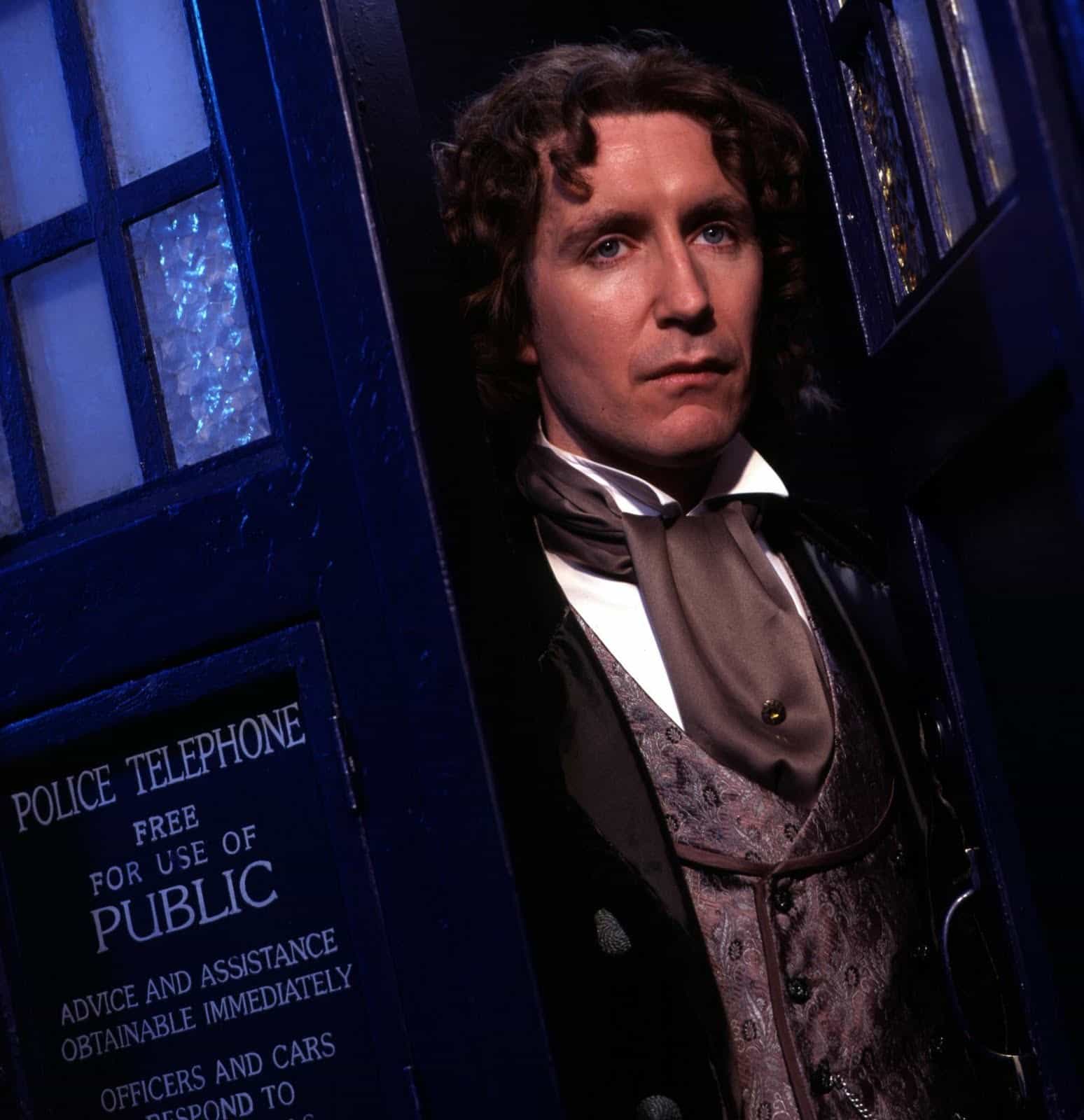 A man stands in the doorway of the TARDIS in this photo from British Broadcasting Corporation.