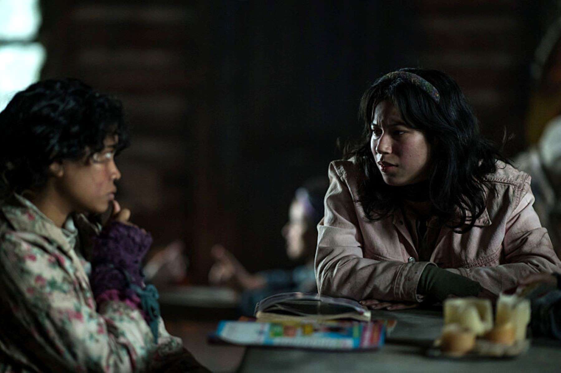 Two girls sit at a table in this photo by Showtime