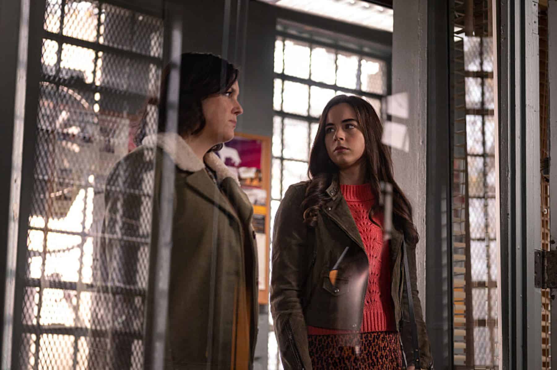 Two women walk through a doorway at a police precinct in this photo by Showtime.