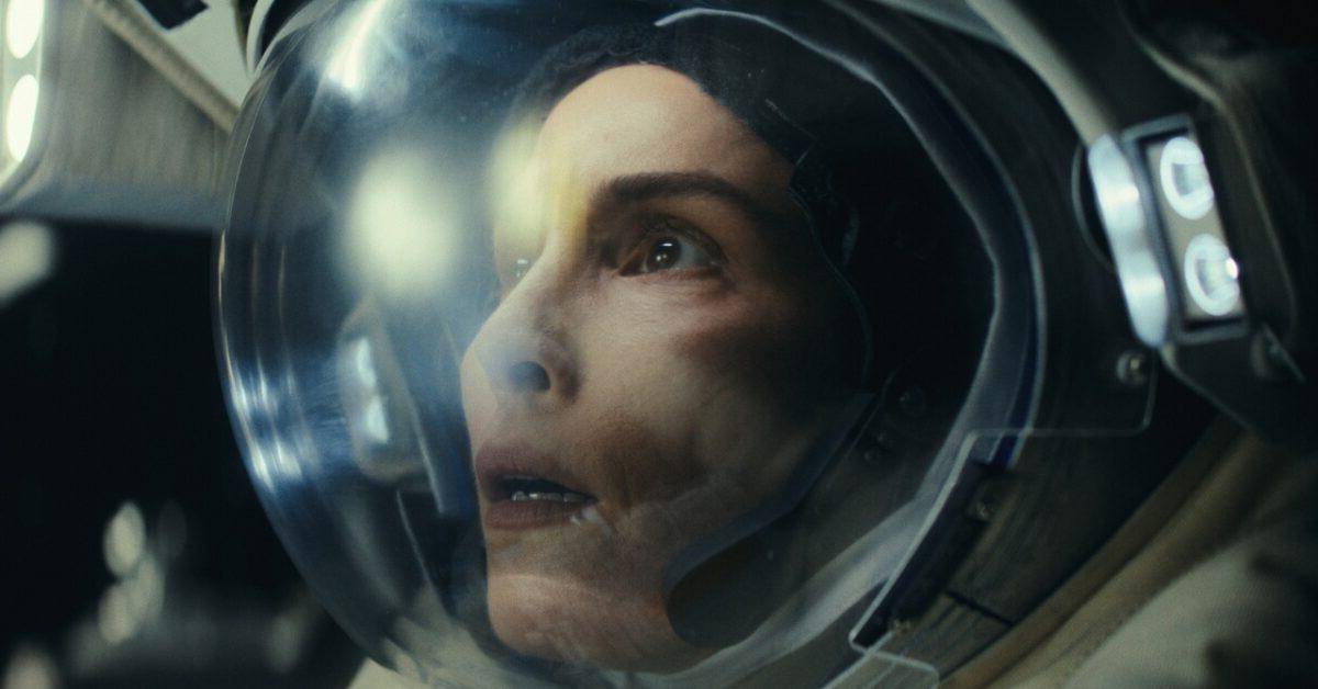 A woman in a space helmet looks into the distance in this image from MacLaren Entertainment.