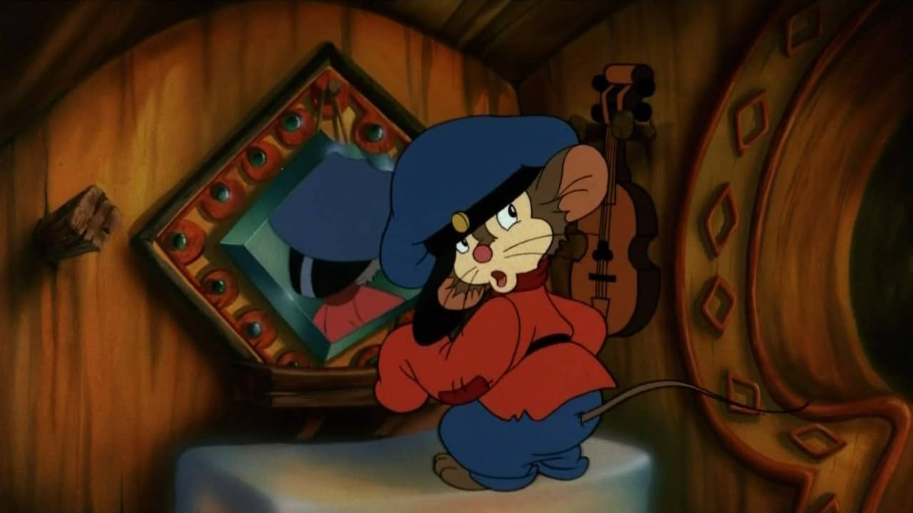 A cartoon mouse looks away from a mirror in this photo from Universal Pictures.