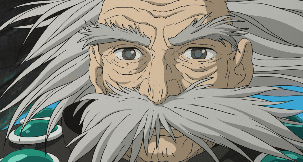 A closeup shot of an animated old man in this image from Studio Ghibli. 