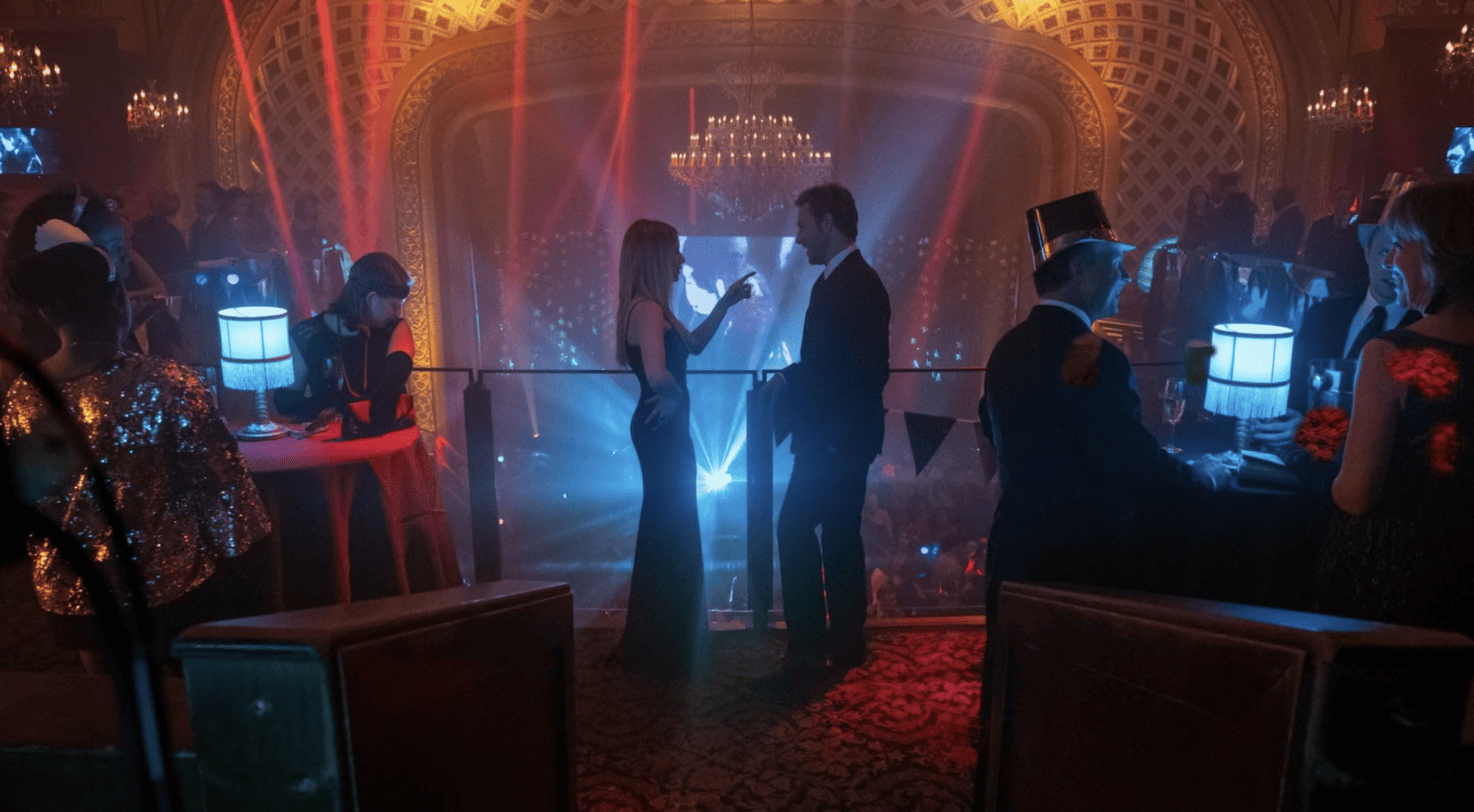 A dressed-up couple stands in a decked-out club in this image from Wonderland Sound and Vision.