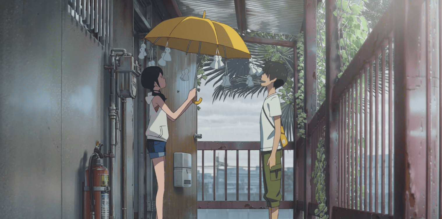A girl with an umbrella and a boy standing in a hallway in this image from CoMix Wave Films 
