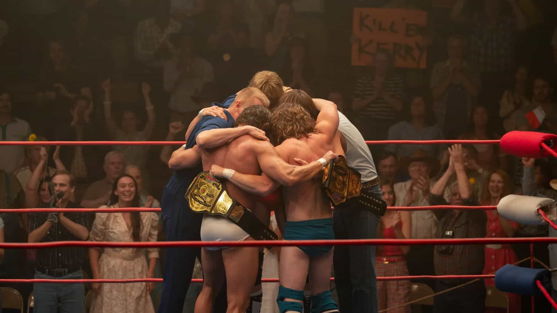 A family huddles together inside a wrestling ring in this image from A24.